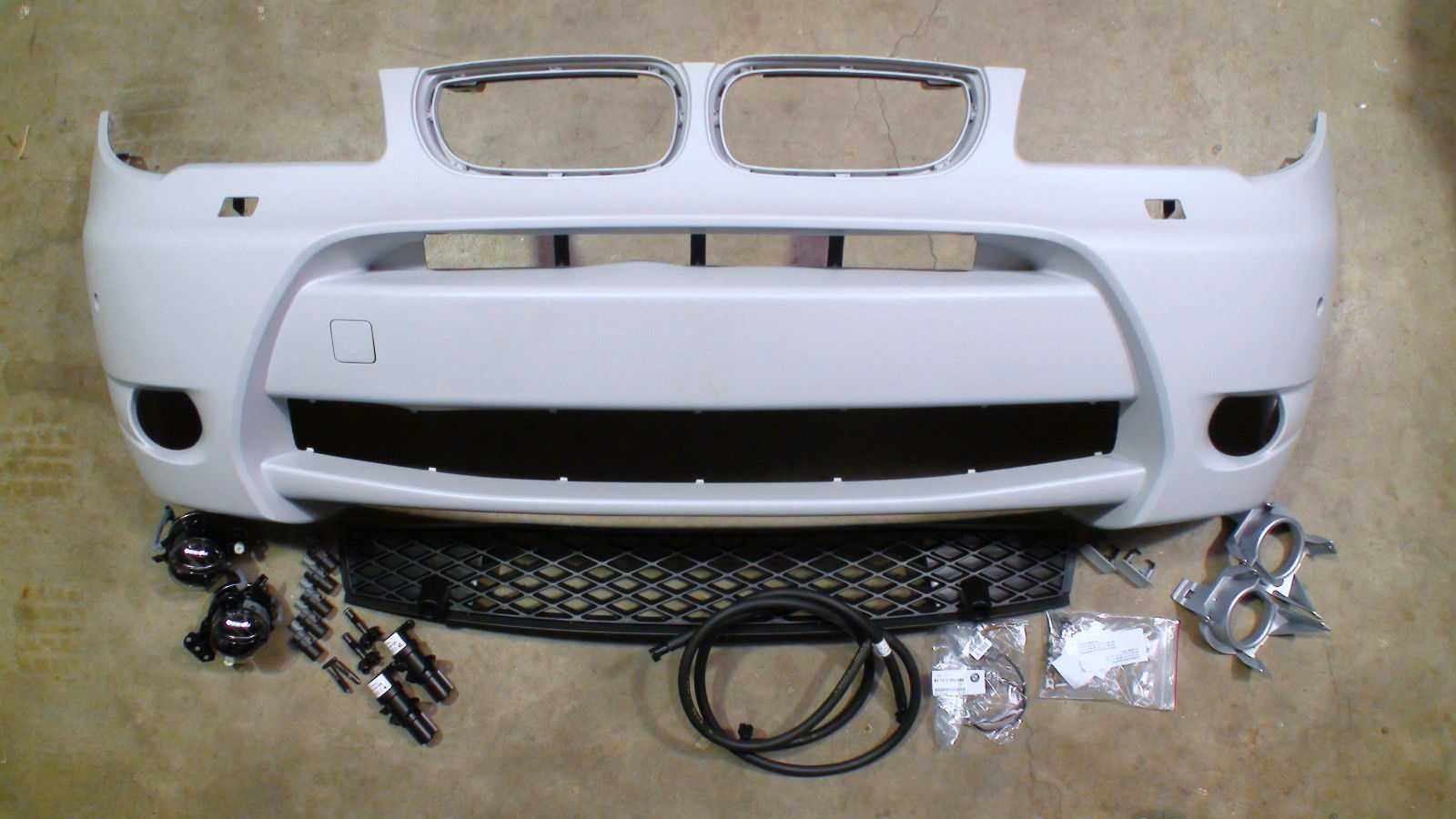 BMW, BMW Aerodynamic Kit Front Bumper Primed X3 E83 with PDC and Headlight Cleaning